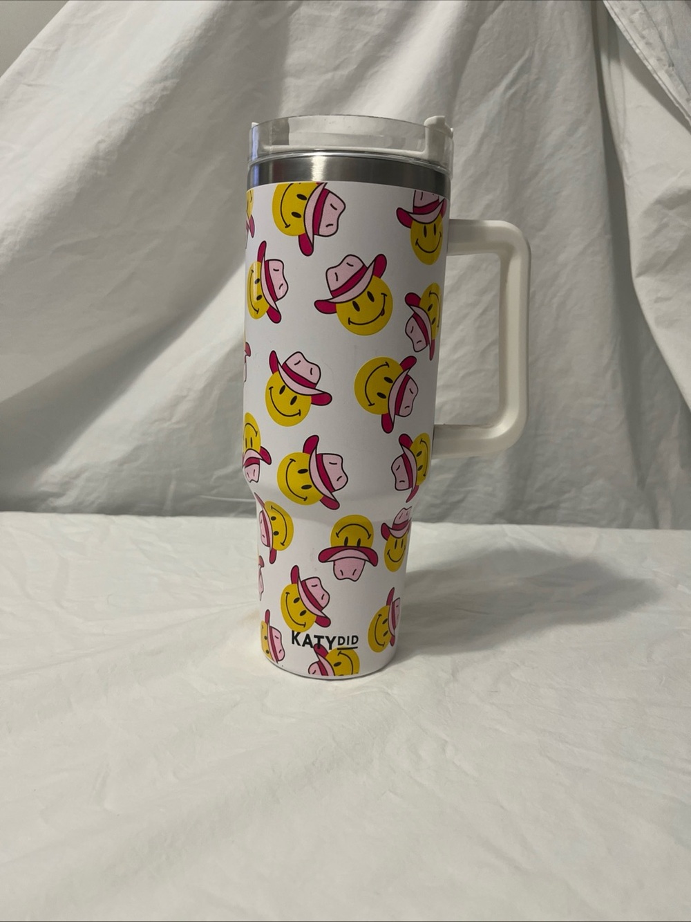 Katydid White Travel Mug with Yellow & Pink Smiley Hat Pattern